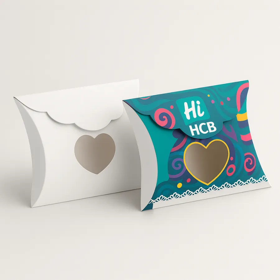 Two candy pillow boxes with handles- showing a plain white design and a bright lollipop pattern- class=